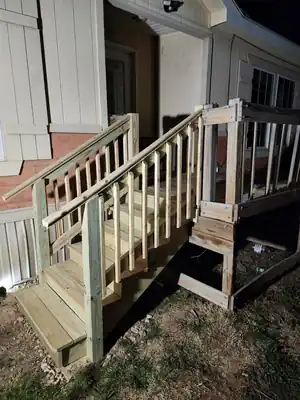 New deck stairs and railing built for an Abilene homeowner